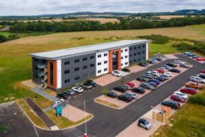 Aerial view of BizSpace Ashford office building and car park