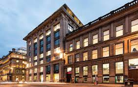 An external shot of Orega's George Square office building in Glasgow at dusk