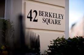 The exterior sign at Pasley Tyler's luxury serviced offices at 42 Berkeley Square in Mayfair