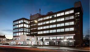 External shot of Bruntwood's Sale Point office building on Washway Road in Sale at night
