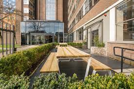 An outside seating area at Bruntwood's Trafford House office property on  Chester Road in Old Trafford