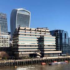 An external shot of Business Space Made Easy - St Magnus House, 3 Lower Thames Street, London , EC3R 6HD from across the River Thames