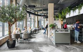 A selection of coworking desks at Colony Workspace at 5 Piccadilly Place in Manchester