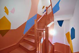 The colourful stairwell at House of Creative, 231 Shoreditch High Street, London Borough of Hackney E1 6PN