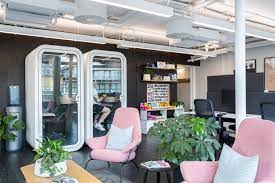 A seating area with pods at Kitt's Bespoke Office Fit-Out for Oatly