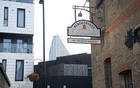 A shot of the exterior with hanging vintage sign at LentaSpace Borough - The Foundry Annexe, Blackfriars, 65 Glasshill Street, SE1 0QR