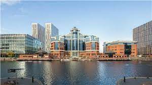 A view of MediaCityUK The Alex across Salford Quays and the Manchester Ship Canal
