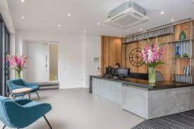 The reception area of Ocubis - Fulham Green, Fulham High Street, London SW6 3JW