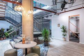 The spiral staircase leading to the private offices and coworking space at Runway East Brighton - York And Elder Works, 50 New England Street, Brighton BN1 4AW
