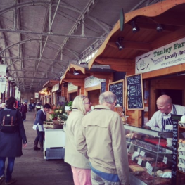 People chatting at the stalls at Ethical Property's Green Park Station in Bath