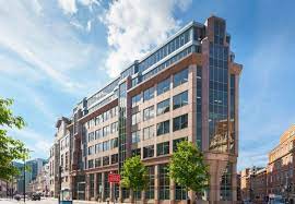 An exterior shot of Targetspace, One Aldgate, City of London, EC3N 1RE on a sunny day