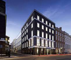 An external shot of The Clubhouse St James’s - 8 St James’s Square, London, SW1Y 4JU at dusk