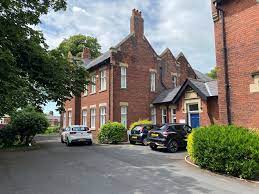 External shot of the DHP Derby House, Lytham Road, Fulwood, Preston PR2 8JE, UK office space property showing the car park