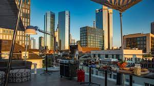 The coworking roof deck at night at Design Offices - Frankfurt Barckhausstrasse - Barckhausstraße 1, 60325 Frankfurt am Main