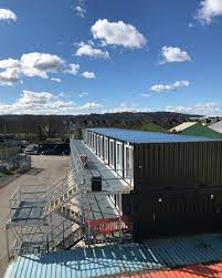 External shot of the Meanwhile Creative, Meanwhile House, Curran Embankment, Cardiff, CF10 5DY coworking office space property on a sunny day