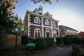 Shot of the Office on the Hill, The Old Free School, George Street, Watford, Hertfordshire WD18 0BX serviced office property at dusk