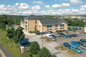 Aerial shot of the Orbit Developments, 1-3 The Courtyard Calvin Street, Bolton, BL1 8PB office property and car park