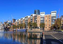 External shot of Purpose Group Canary Wharf - Deben House, 1 Selsdon Way, Tower Hamlets, London E14 9GL with water in the foreground