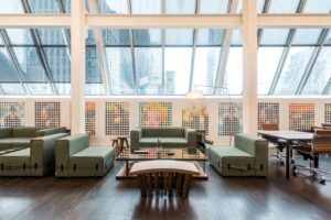 Coworking office space to rent at Rent 24 Manhattan Office - 25 West 39th Street, New York, NY 10018 with large skylight providing views of the NYC skyline