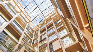 The skylit atrium looking up within the Republic London Import Building - 2 Clove Crescent, East India Dock, London E14 2BE