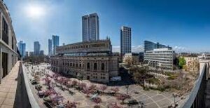 A view of the Satellite Offices Opera Square XIV - Opernplatz. 14, 60313 Frankfurt am Main office space property on a sunny day and showing the public square