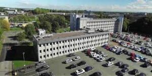 Aerial view of UBC Warrington - Rutherford House, Warrington Road, Birchwood, Warrington, Cheshire, WA3 6ZH and the car park