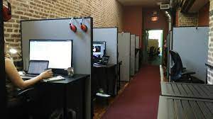 Coworking desk rentals with partitions at Park Slope Desk 501 11th Street, Brooklyn
