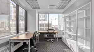Office space with natural light for rent at Regus - 101 6th Avenue, One Hudson Square, New York, NY 10013, United States