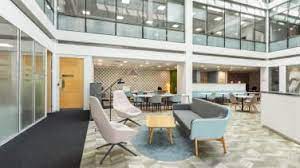 Coworking space within the atrium at Regus - 200 Brook Drive, Green Park, Reading, Berkshire RG2 6UB