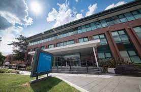 Shot taken looking up at Regus - Adamson House, Towers Business Park, Wilmslow Road, Didsbury, Manchester M20 2YY on a sunny day