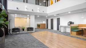 The atrium with coworking booths at Regus - Jubilee House, 3 The Drive, Brentwood, Essex CM13 3FR