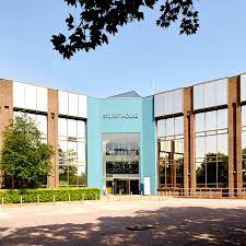 Wide external shot of the Regus - Stuart House, St John's Street, Peterborough PE1 5DD office property and car parking