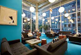 A coworking lounge at The Yard - 106 W 32nd St, New York, NY 10001