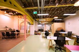Co-working desk spaces at Camden Collective - Auction Rooms, 5-7 Buck Street, Camden, London NW1 8NJ