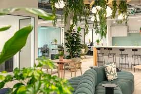 Coworking space with biophilia in the foreground at Spacemade - Fulham Works, Fulham Broadway Centre, Fulham Road, London SW6 1BW