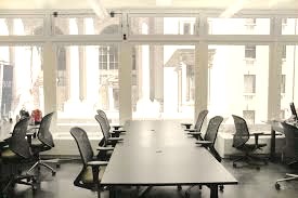 Naturally lit cowokring seats at Ensemble Coworking Space - 10 W 37th St, New York, NY 10018