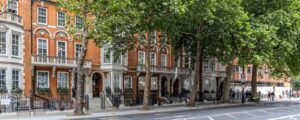 Exterior shot of Flex by Grosvenor - 132 Buckingham Palace Road, Belgravia, SW1W 9SA with trees in the foreground