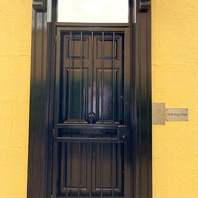 A panelled door at Nammu Workplace - 559A Kings Road, London, SW6 2EB