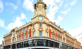 External shot of x+why, Arding & Hobbs, 10 St John's Rd, London, SW11 1PN with blue sky in the background
