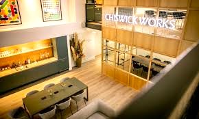 A coworking area at x+why, Chiswick Works, 100 Bollo Lane, London, W4 5LX