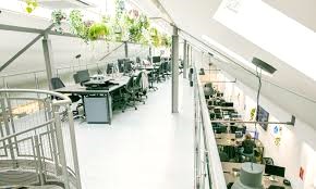 An airy shared workspace at x+why, Huguenot Place, 17 Heneage Street, London, E1 5LN
