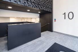 The reception desk at the Sub800 - 10 Lloyds Avenue, City of London, London, EC3 3AJ office building