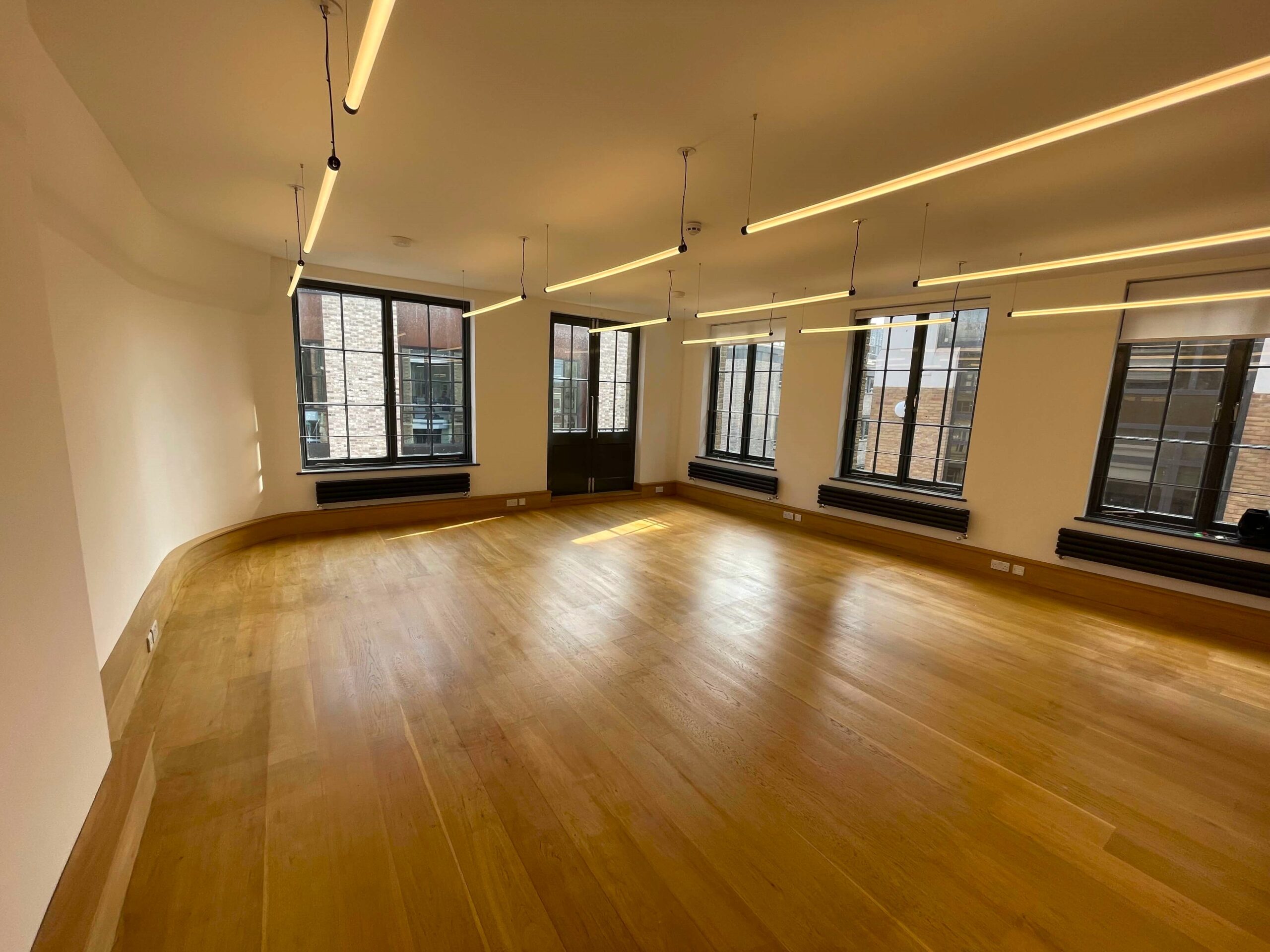 An office suite to let with large windows at Sub800 - 78A Luke Street, London EC2A 4EG