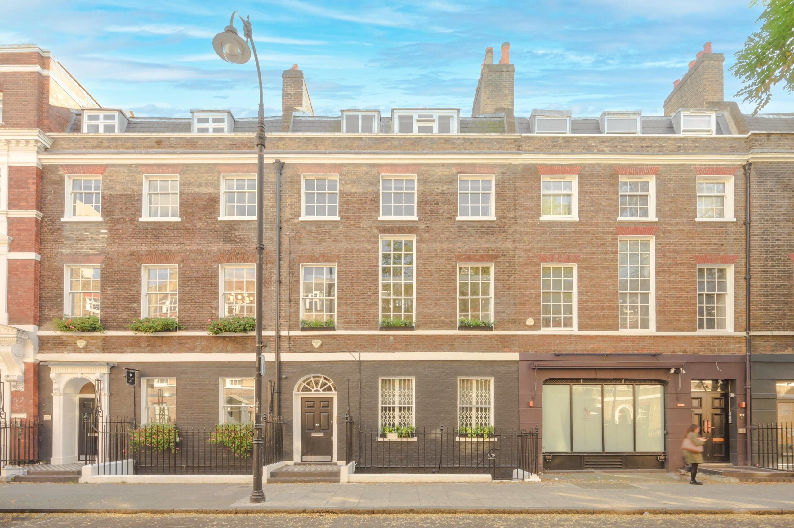 The view from across the street of Sub800 - 8 Percy Street, Fitzrovia, London, W1T 1DJ on a sunny day