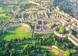 An aerial view of Bath city centre showing various commercial and residential properties including the Royal Crescent