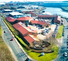 Aerial view of the North East BIC - Wearfield, Enterprise Park East, Sunderland, SR5 2TA office building showing road links and car parking facilities