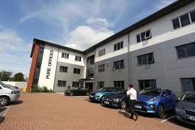 External shot showing the car park at Pure Offices - Cheltenham Office Park, Hatherley Lane, Cheltenham GL51 6SH