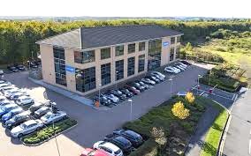 An aerial shot of Wizu Workspace - Osprey House, Pegasus Business Park, Castle Donnington, DE74 2UZ and its car park