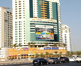 External shot of A2Z Business Center - Mai Tower, Al Nahda 1, Dubai, UAE showing car parking