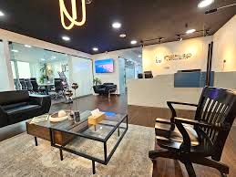 The reception area of IBC - Dubai National Insurance Building, Port Saeed, Dubai with a private office in the background